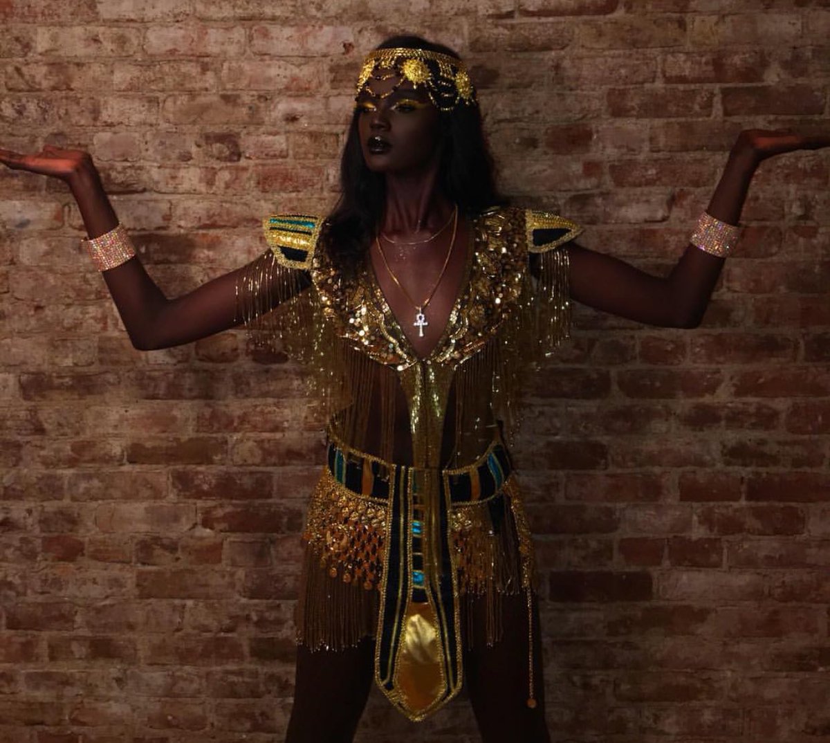 Duckie Thot as Cleopatra