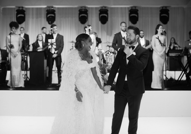 Serena in her second gown by Versace with her husband Alexis. Photo by Mel Barlow and Allan Zepeda