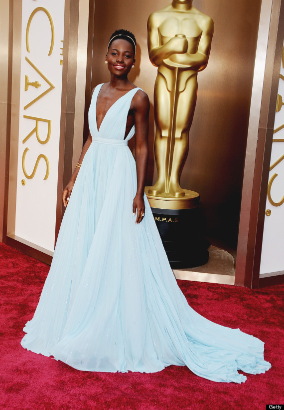 Lupita Nyong'o attends in 2014 wearing Prada and Fred Leighton jewelry. Photo by Steve Granitz/WireImage