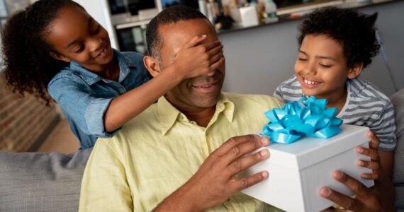 kids surprising their dad who don't want gifts for father's day
